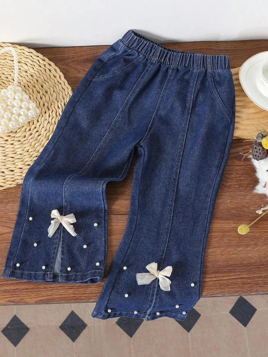 ファッション フェイクパール リボン デニム フレアジーンズ